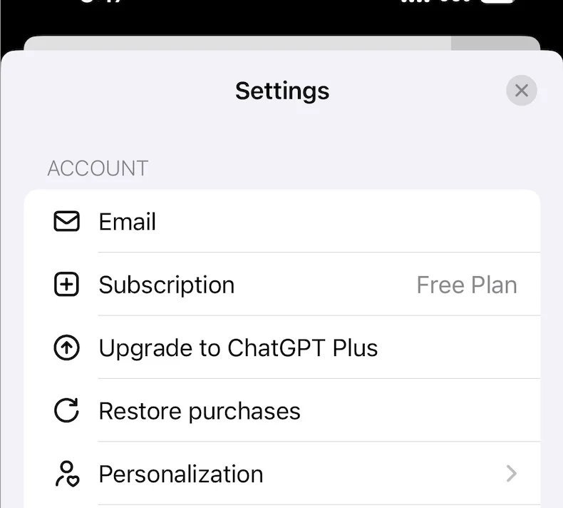ChatGPT iOS 设置页中的 Upgrade to ChatGPT Plus 与 Restore purchases 入口